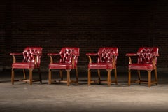 Set Of Four Tufted Leather Bankers Chairs in Red