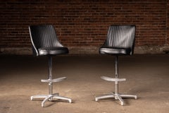 Pair of MCM Black Vinyl Swivel Chairs by Chromcraft