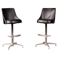 Pair of MCM Black Vinyl Swivel Chairs by Chromcraft