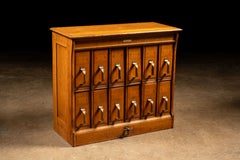 Circa 1910 Yawman and Erbe Oak Twelve-Drawer Vertical Filing Cabinet