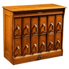 Circa 1910 Yawman and Erbe Oak Twelve-Drawer Vertical Filing Cabinet