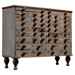 Antique 45-Drawer Industrial Hardware Cabinet on Cast Iron Legs