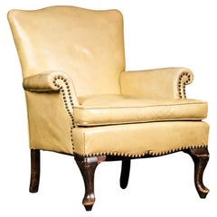 Fauteuil vintage en cuir jaune pâle