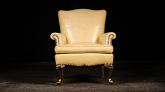 Fauteuil vintage en cuir jaune pâle