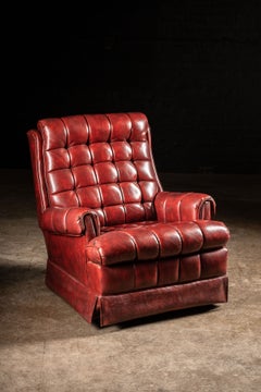 Fauteuil pivotant vintage en cuir capitonné, rouge