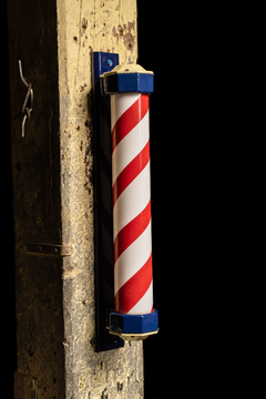 Antique Red and White Milk Glass Barbershop Pole with Porcelain Caps