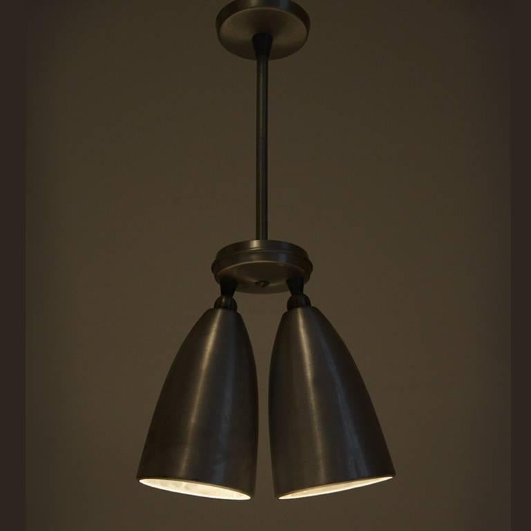 Early 1950s pair of Prescolite double cone swiv-o-lite pendants
Each cone can be rotated individually in all directions.