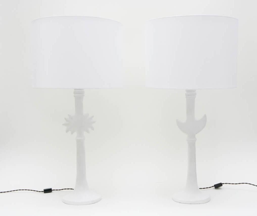 A pair of cast resin/plaster iconic sun and moon table lamps after Diego Giacometti by Sirmos Company.