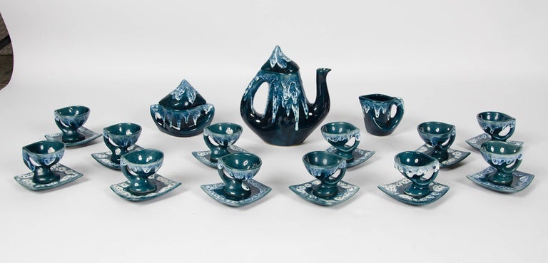 A beautiful Vintage example of Dark blue 15 pieces coffee set from the French pottery ceramic manufacturer Vallauris.
