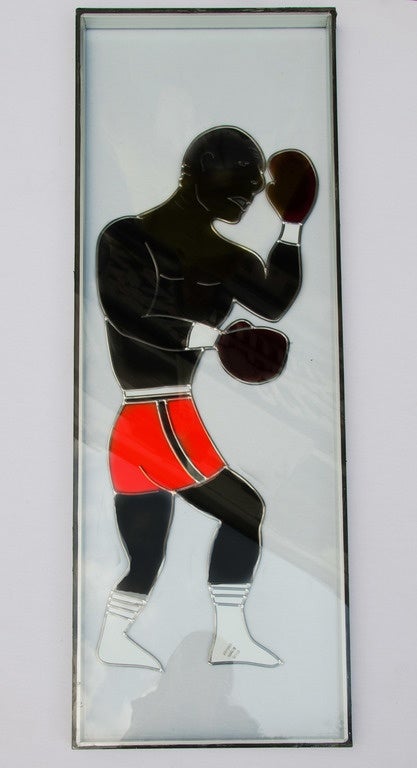 80's stained glass boxers. Circa 1983
A dipiction of of 2 boxers, and their referee. They are set in double glazed glass. Maker unknown.