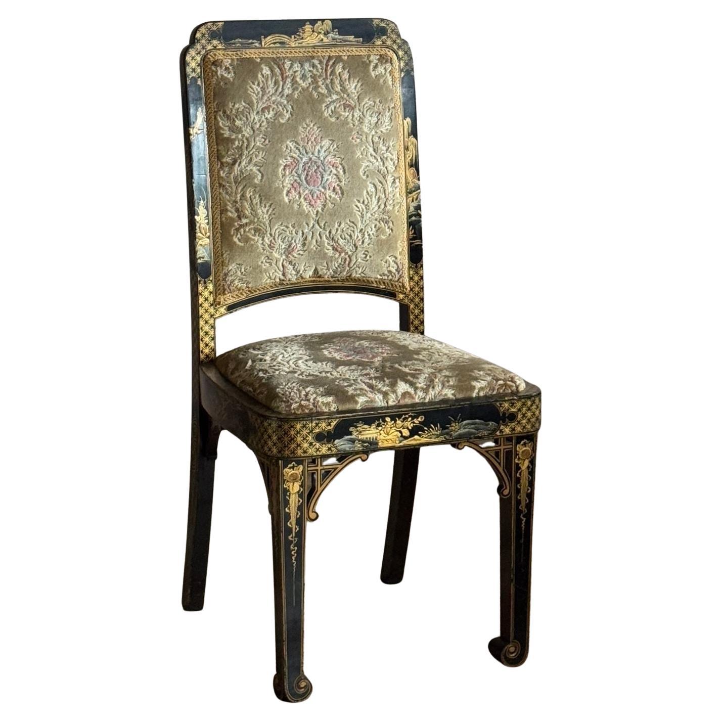 black and gold lacquered chinoiserie dining chairs. For Sale