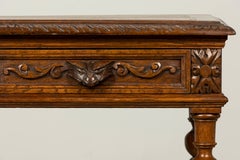 Late 19th Century French Henry II Carved Oak Writing Desk