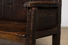 18th Century Spanish Rustic Oak Bench with Carved Panels and Dark Patina