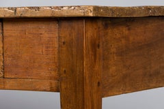 Early 19th Century French Provincial Fruitwood Farmhouse Table with Two Drawers