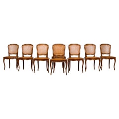 Set di 8 sedie da pranzo francesi in noce intrecciato in stile Luigi XV, risalenti ai primi anni del XX secolo