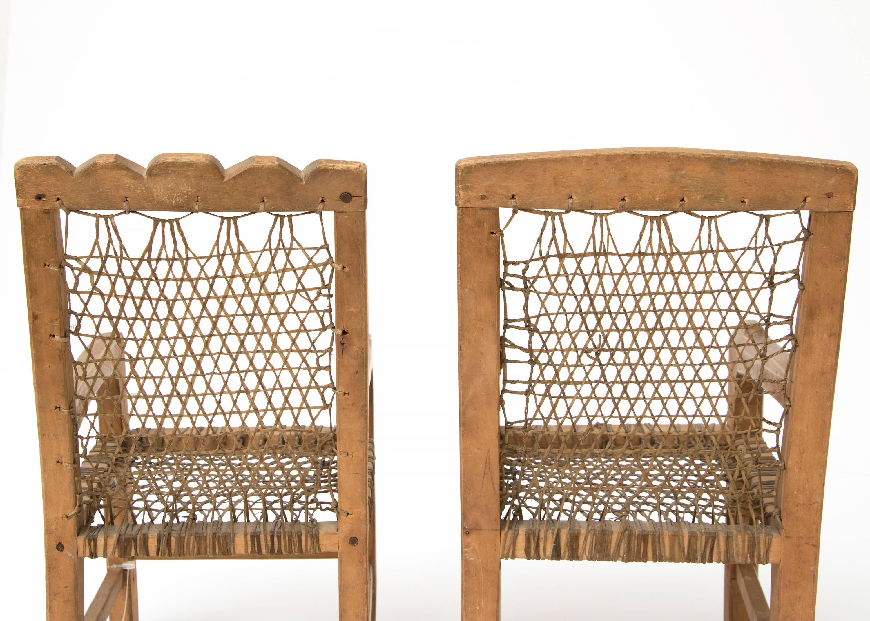 A rare pair of Northwest Coast miniature chairs, likely made for a North American Indian girl's dolls. The Northwest Coast culture area spans the coastal areas of Oregon, Washington, British Columbia and Southeast Alaska. Tribal groups include