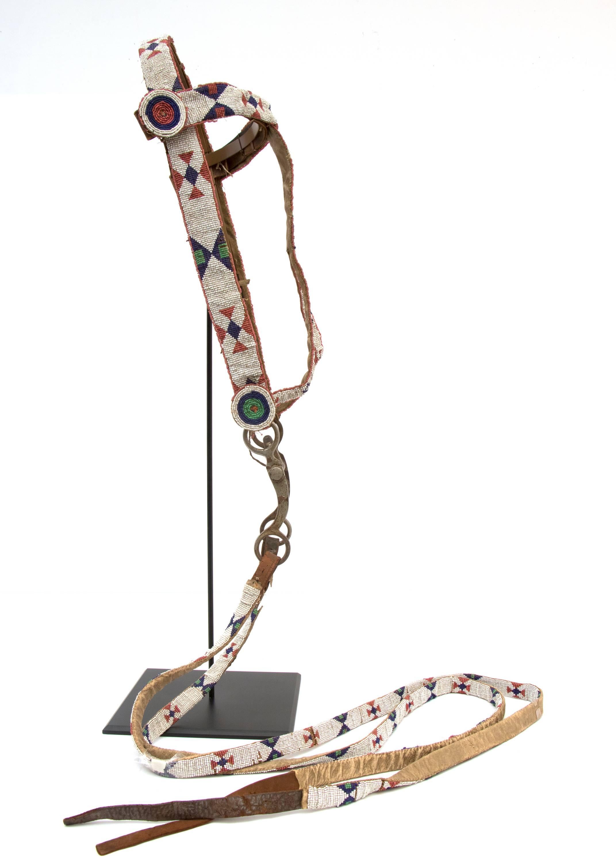A horse bridle/headstall. Beaded with glass trade beads in typical Sioux geometric design.

A Nomadic tribe, the Sioux are associated with areas of the great plains of the United States including present-day North and South Dakota, Minnesota,