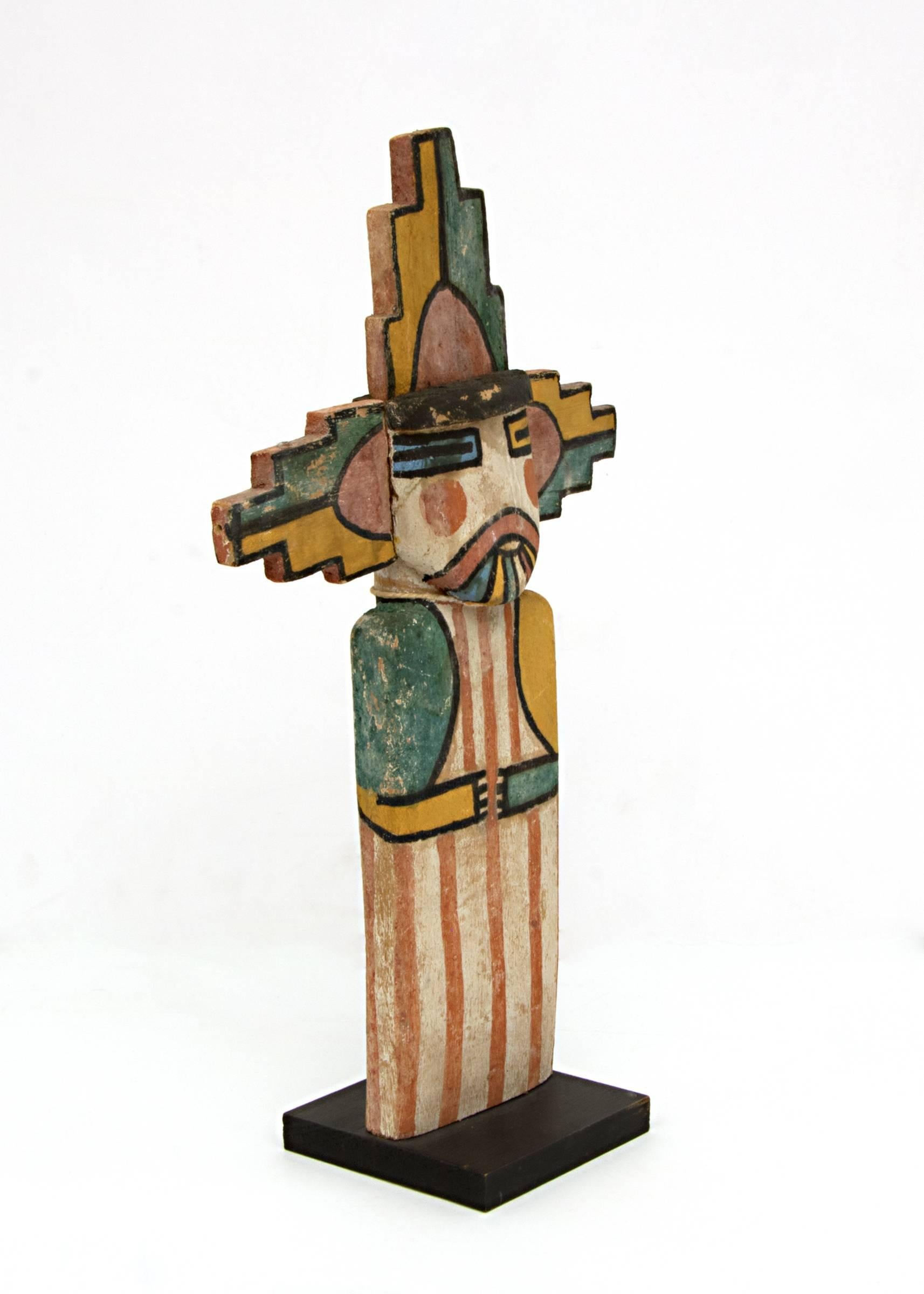 Shalako Mana Katsina Doll. Constructed of cottonwood with pigment. Custom display stand is included and overall height with the stand is 13.5 inches. The Doll without the stand measures 12.5 inches, height.

The Hopi tribe, now a sovereign Native