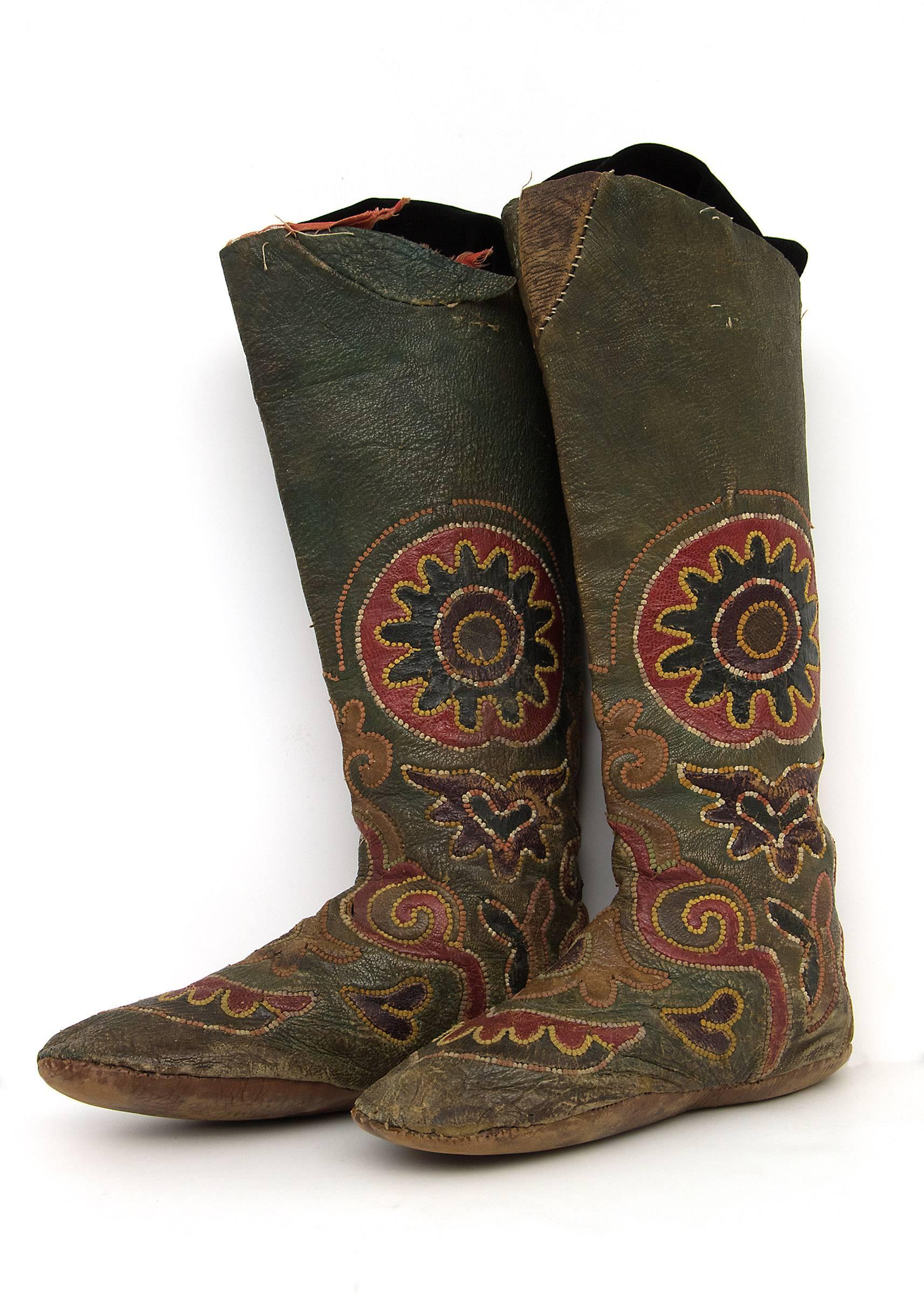 Antique Embroidered Kirghiz Riding Boots originating from Kyrgyzstan in Central Asia.  Likely created between 1900 - 1930s.