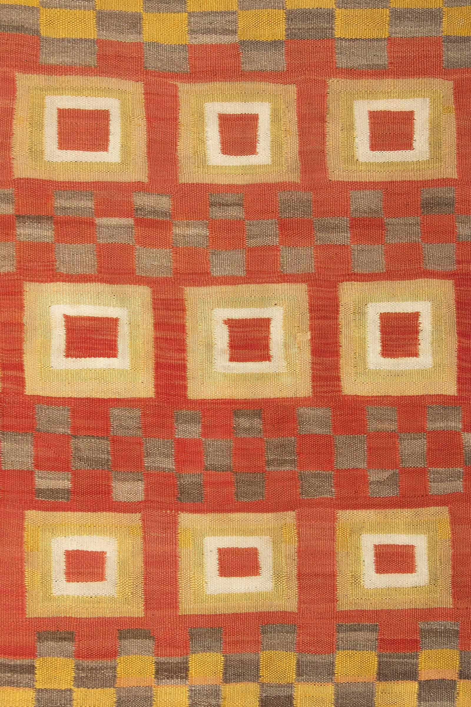 This unique textile was created during the late 19th or early 20th century by a Navajo weaver. The composition has alternating bands of inset squares and checkerboard motifs. Woven of native hand-spun wool with natural fleece and aniline dye. 
