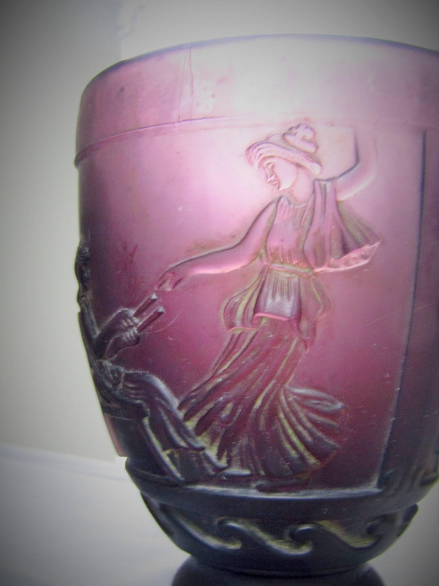 1920s signed Georges De Feure molded pressed amethyst glass vase. 


