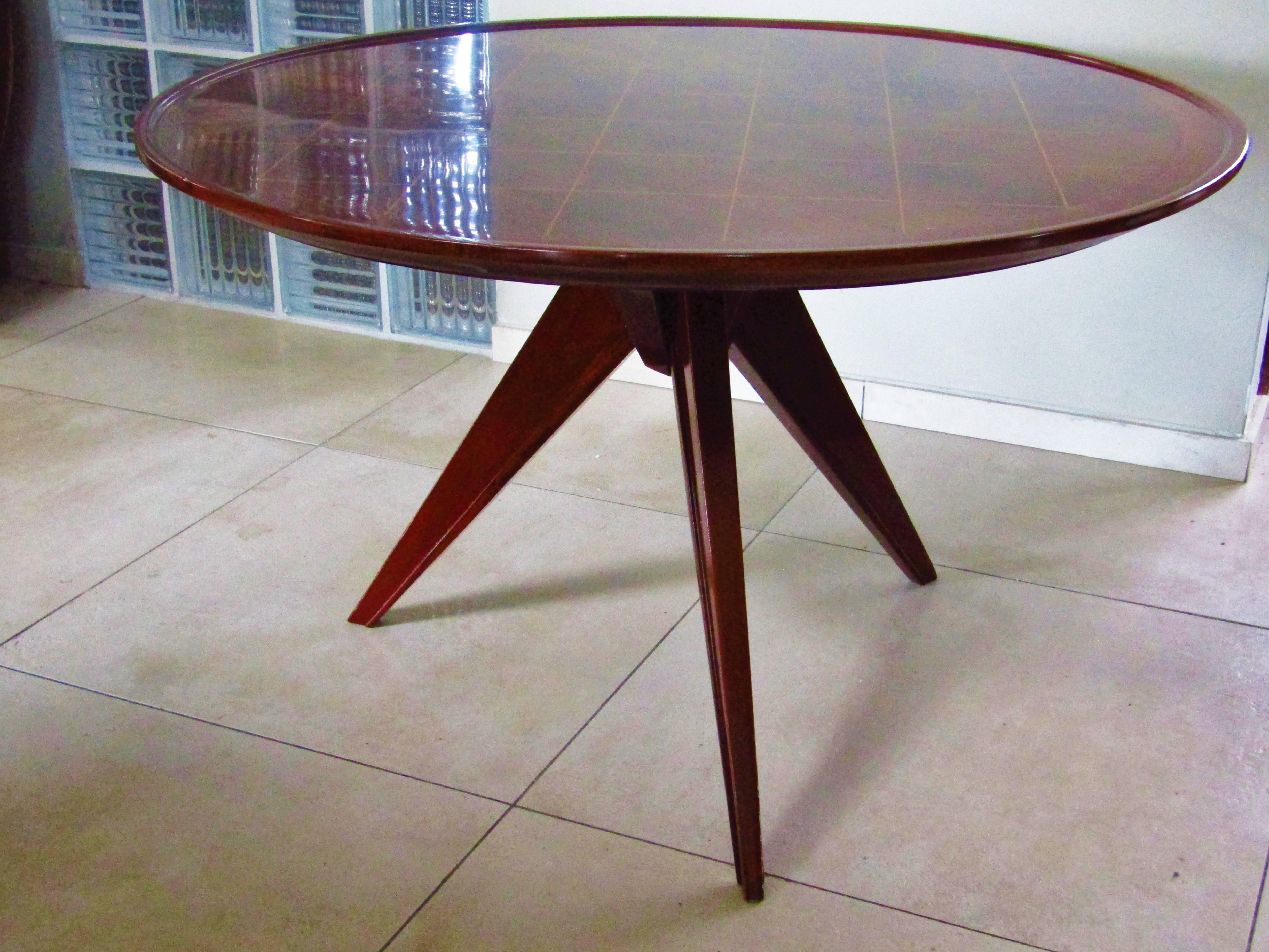 Midcentury Art Deco rosewood coffee table, France, 1940s. With sycamore inlays. Full restored with high gloss lacquer.

 