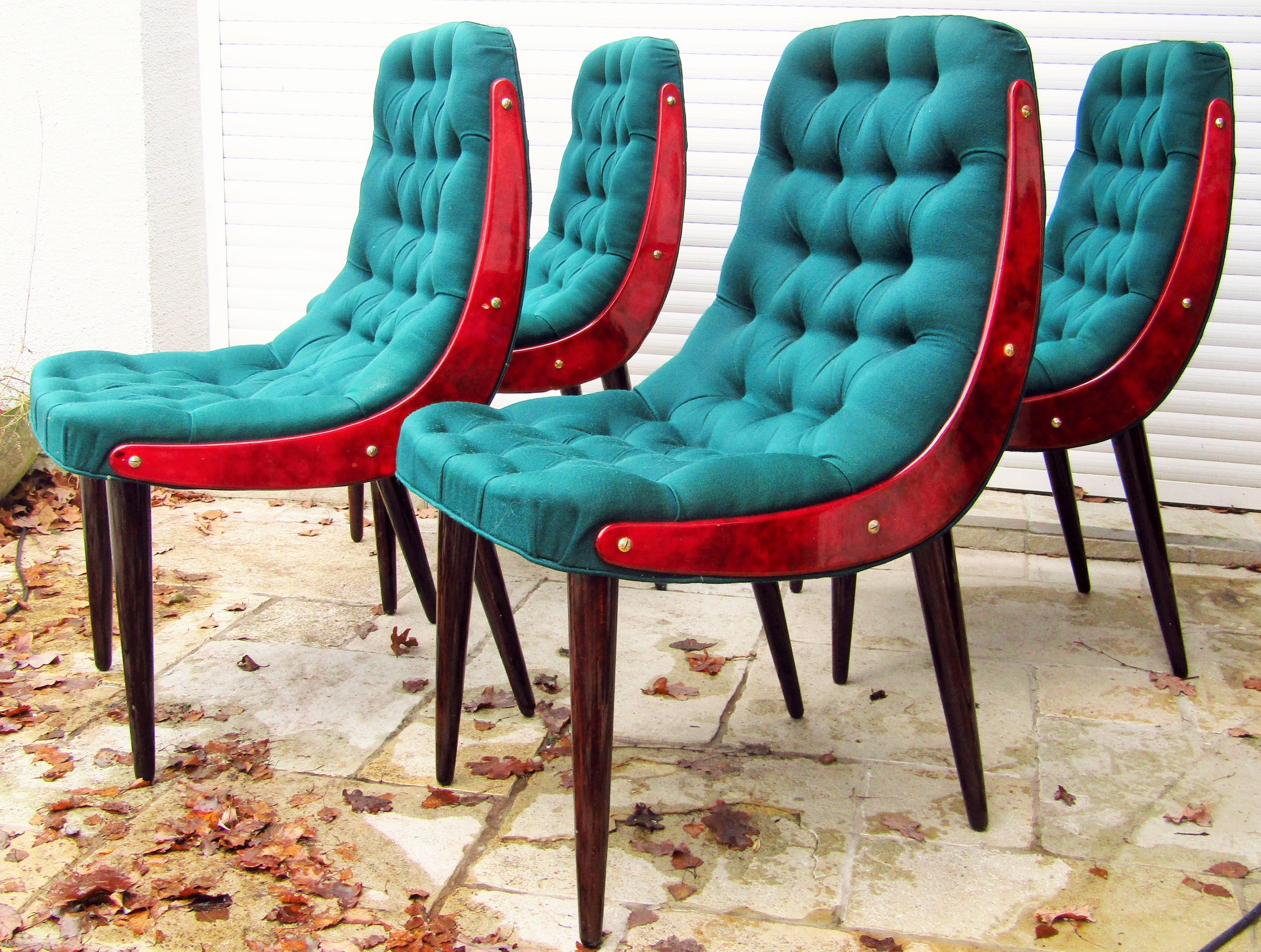 Set of four midcentury dining chairs by Aldo Tura, Italy, 1960. Frames covered in goatskin with high gloss laquer. Chesterfield upholstery in perfect vintage condition.



 