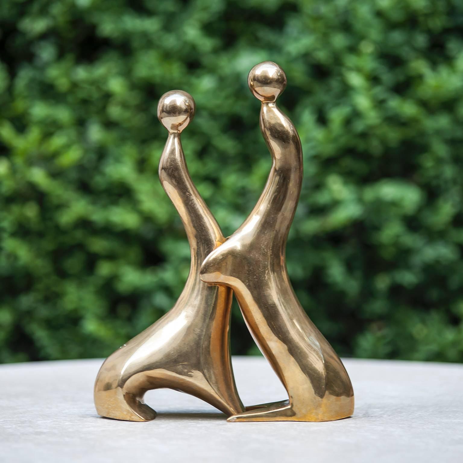 Golden seal dog bookends in solid brass and good vintage condition,
made by Penco, USA, 1960.