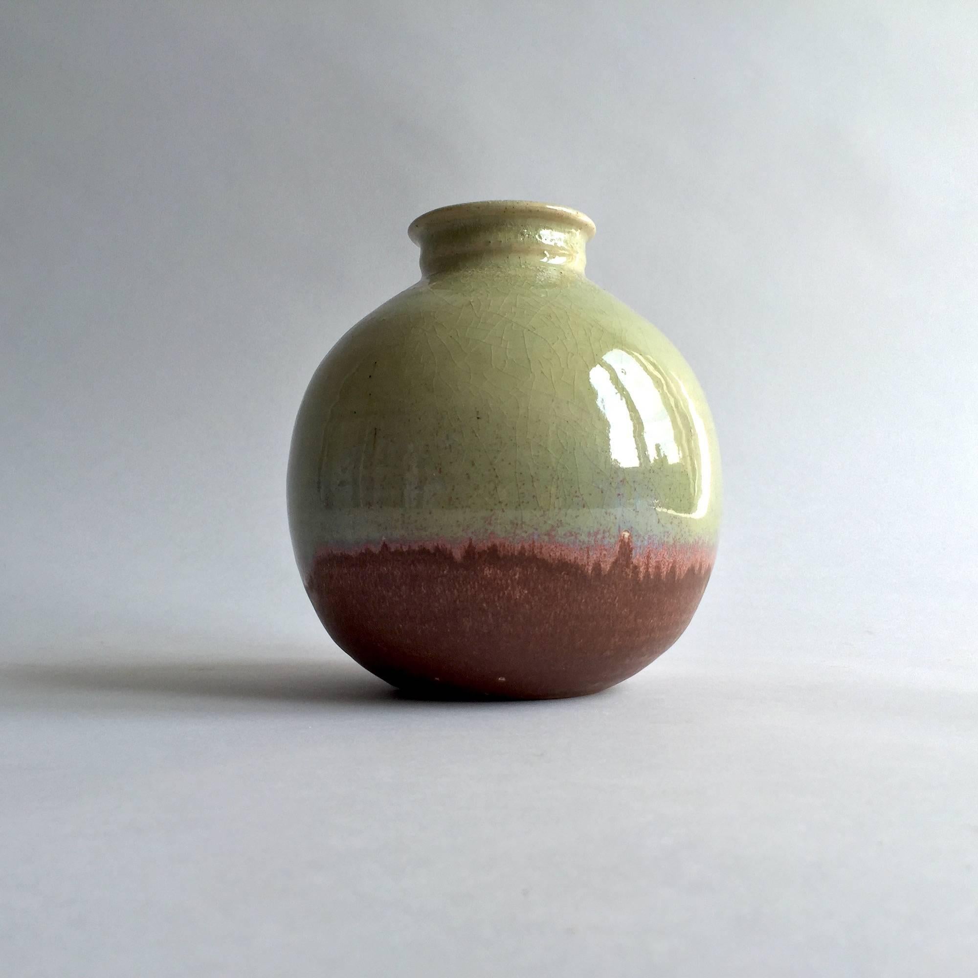 Robert Sturm Studio ceramic, Germany, signed.

Fantastic art pottery object in green and dark red glaze, made by the German pottery artist Robert Sturm in 1980s.