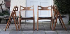 Four Hans Wegner CH29 Sawbuck Chairs