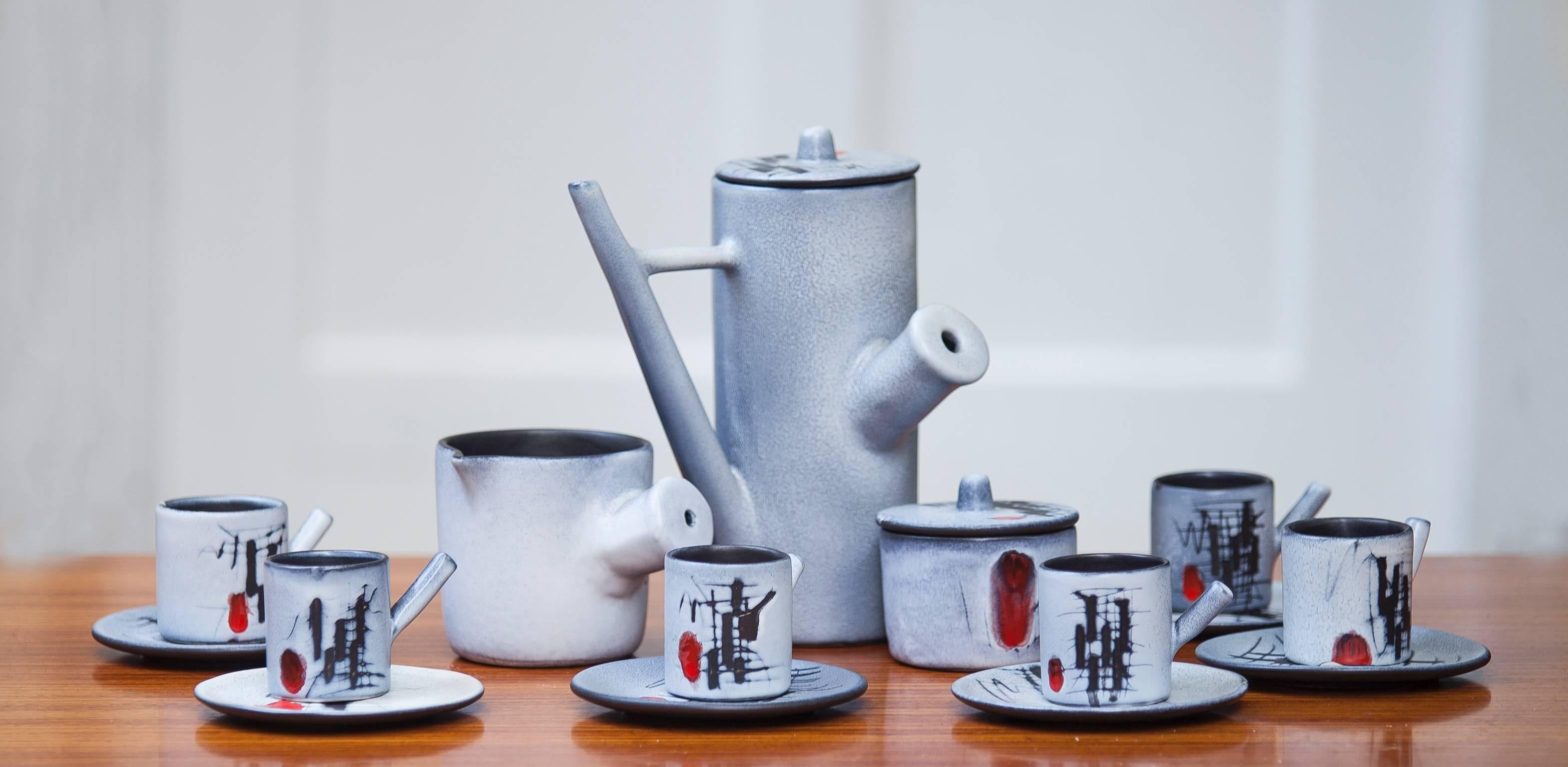 Vallauris ceramic tea set, France, 1960.

Milk H 10.5, sugar H 7.5, tea H 25, cup H 6.5, dish D 14.