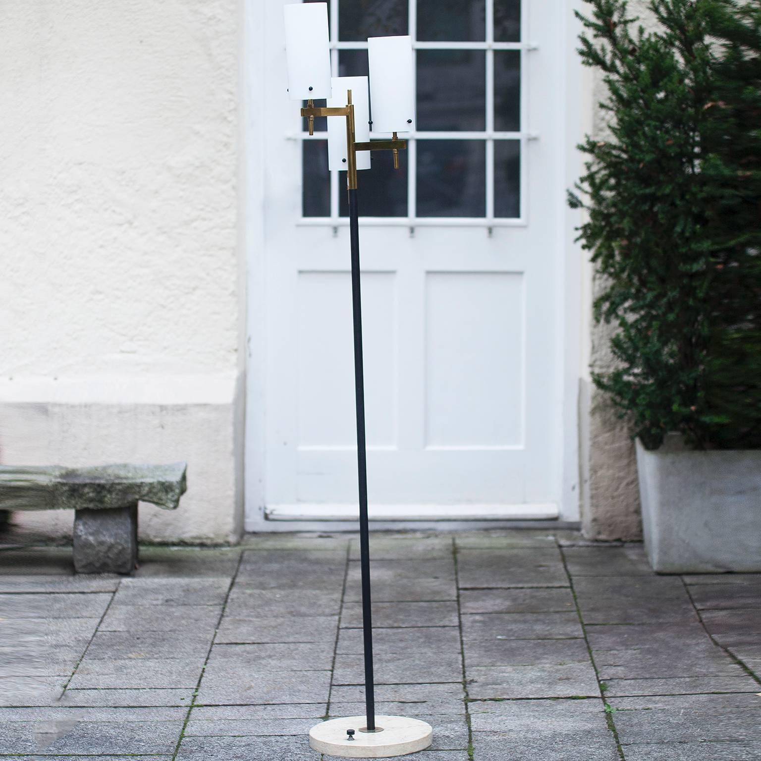 A brass, marble base and three opaline glasses, attributed Stilnovo floor lamp. Italy 1970s.


