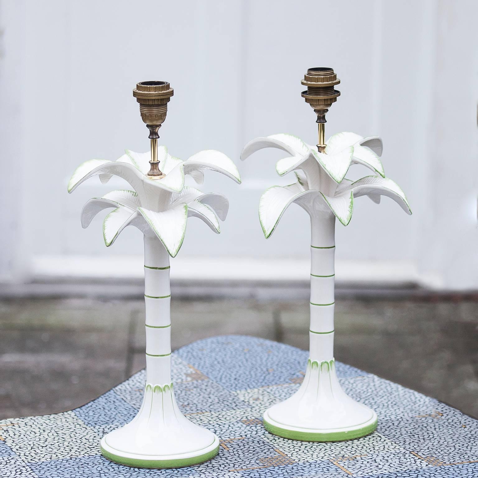 Beautiful sculptural palm table lamps from Italy 1968,
they are made in fine white and green porcelain.
Measures: H 56 x D 28 cm.