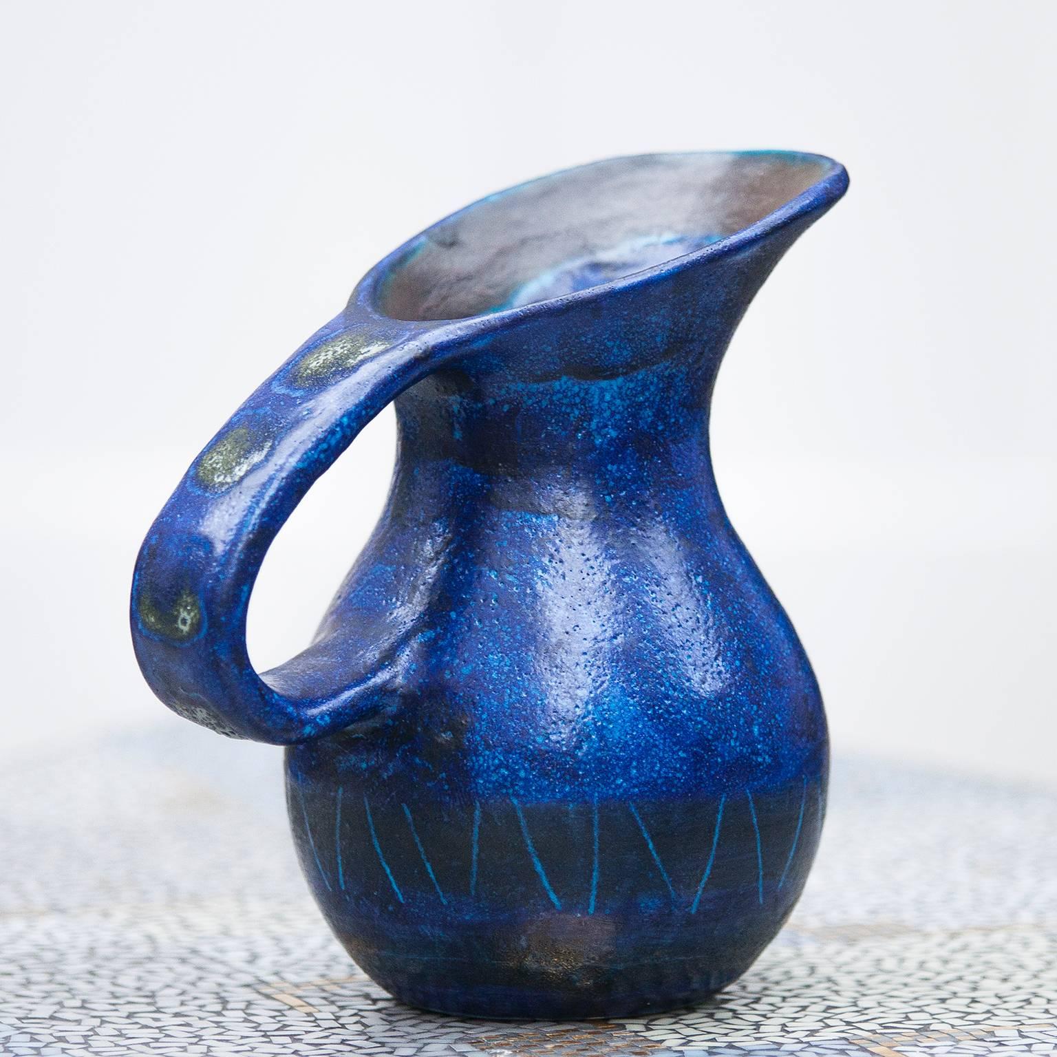 blue ceramic pitcher