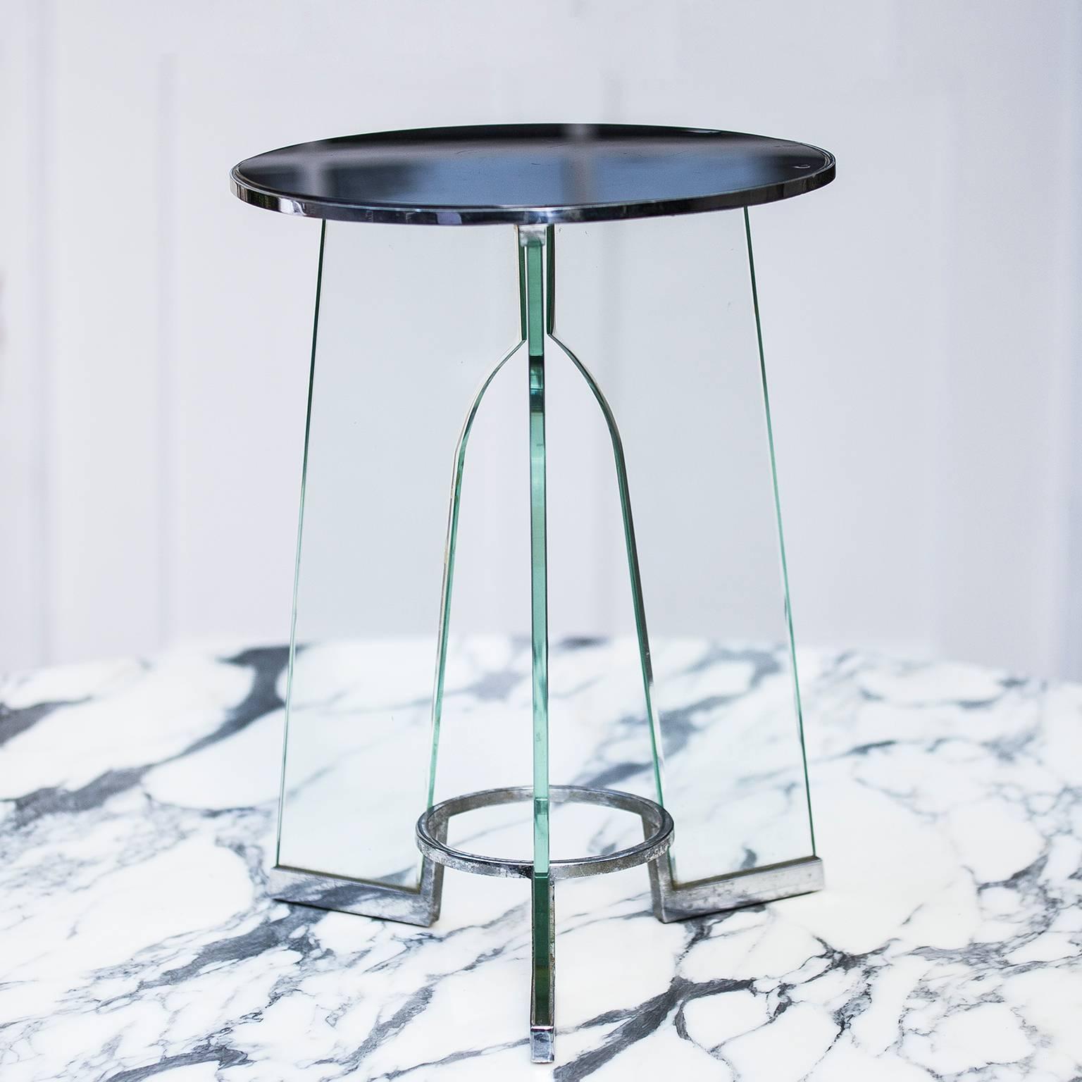 Gio Ponti occasional side table by Fontana Arte, Italy, 1931.
Black Vitrolite, tempered glass, chrome-plated brass.
Signed with acid-stamped manufacturer's marks to top and legs.
Very good original condition.
 