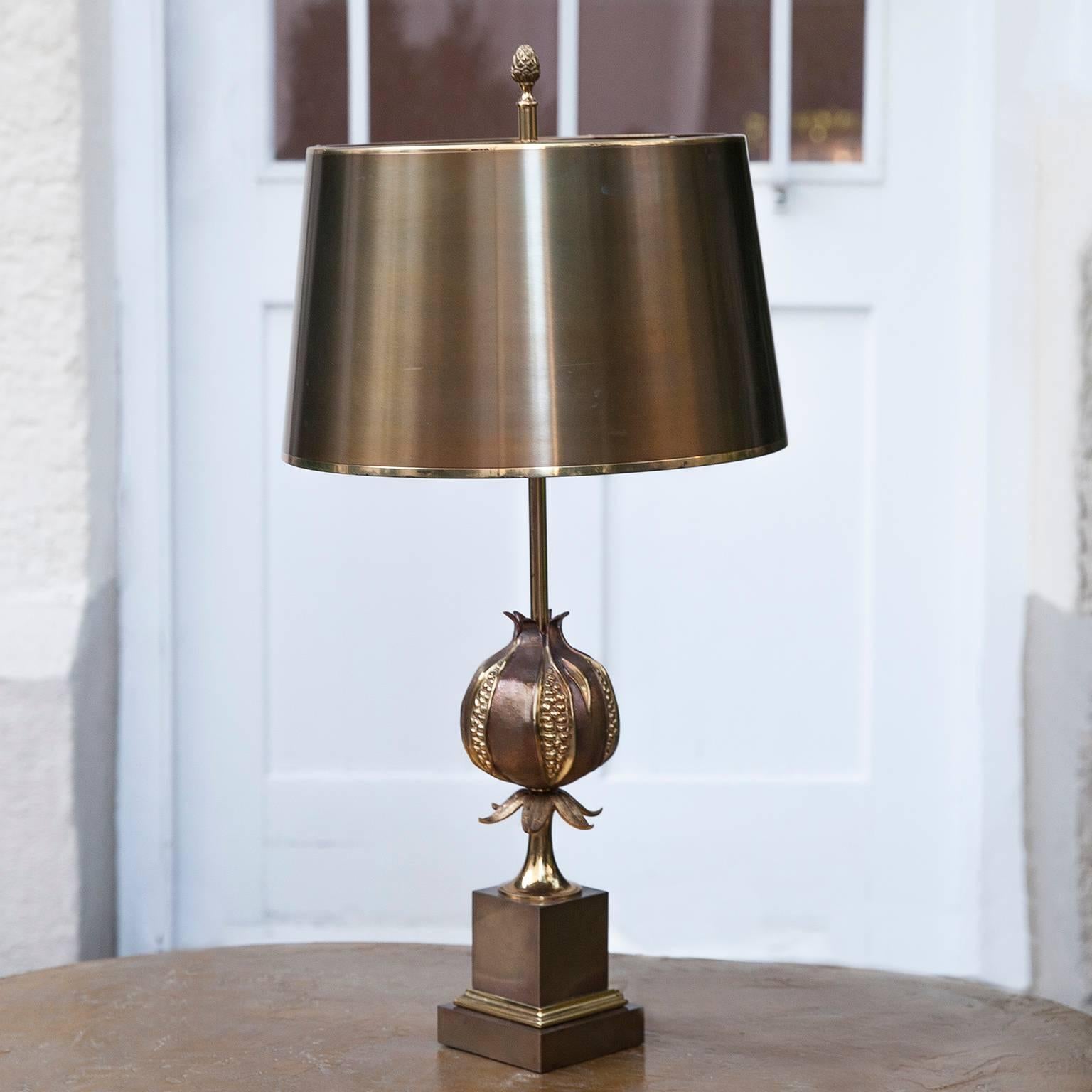 Fantastic bronze table lamp model 'Pomegranate' by Maison Charles. Bronze patinated brass shade and base, signed on the base, France, 1970s.

Measures: H 71, D 36 cm.