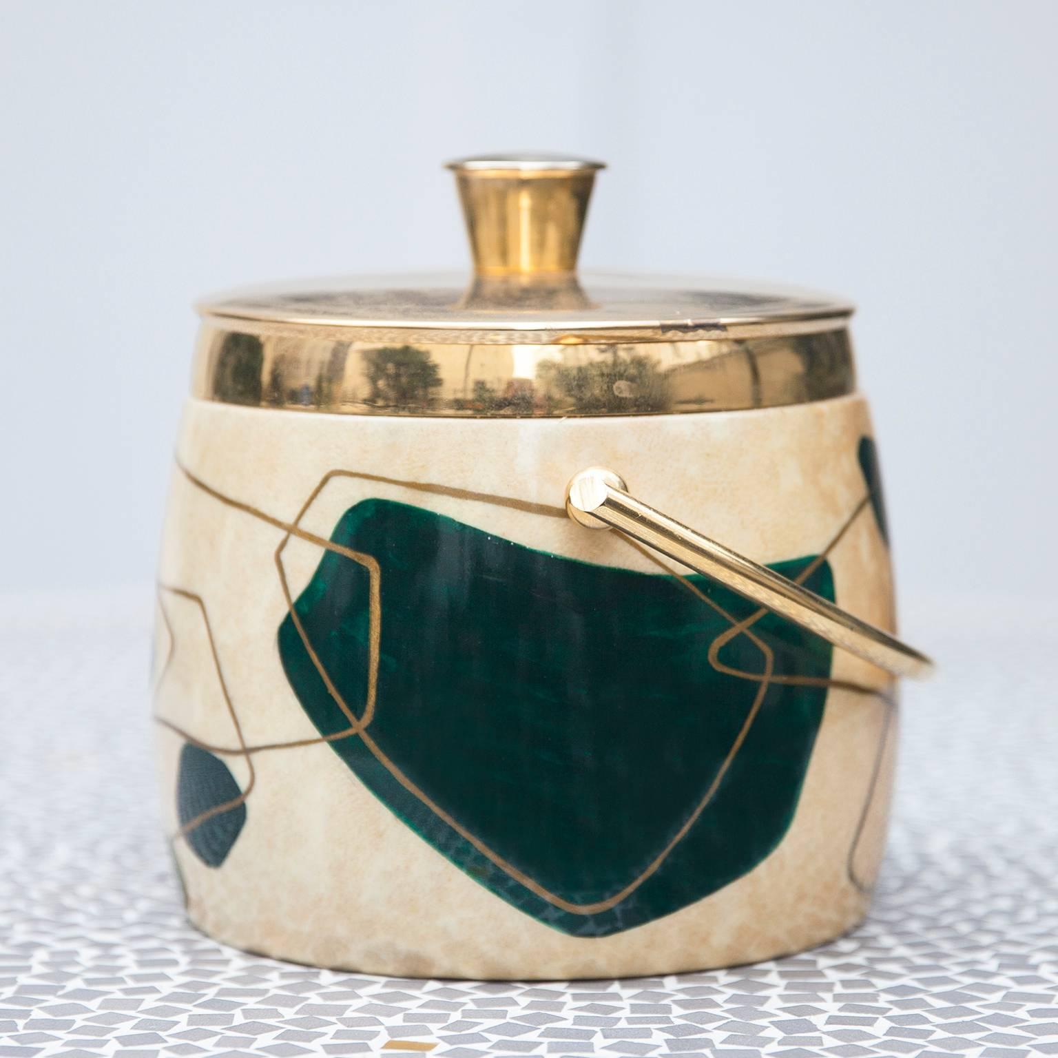 Wonderful ice bucket with geometrical motif and brass inlay, made by Aldo Tura, Milano, 1960s.