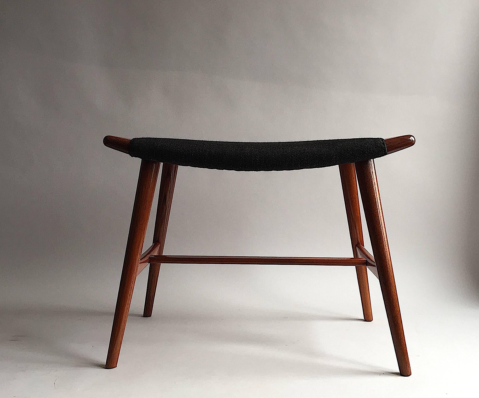 Hans J. Wegner (Denmark)

Teak frame Piano bench from Hans J. Wegner with original dark grey wool upholstery. Made by AP Stolen, Denmark (Anker Pedersen). 

Model AP-30. Designed 1957

This Wegner piano stool, though it was made to stand as