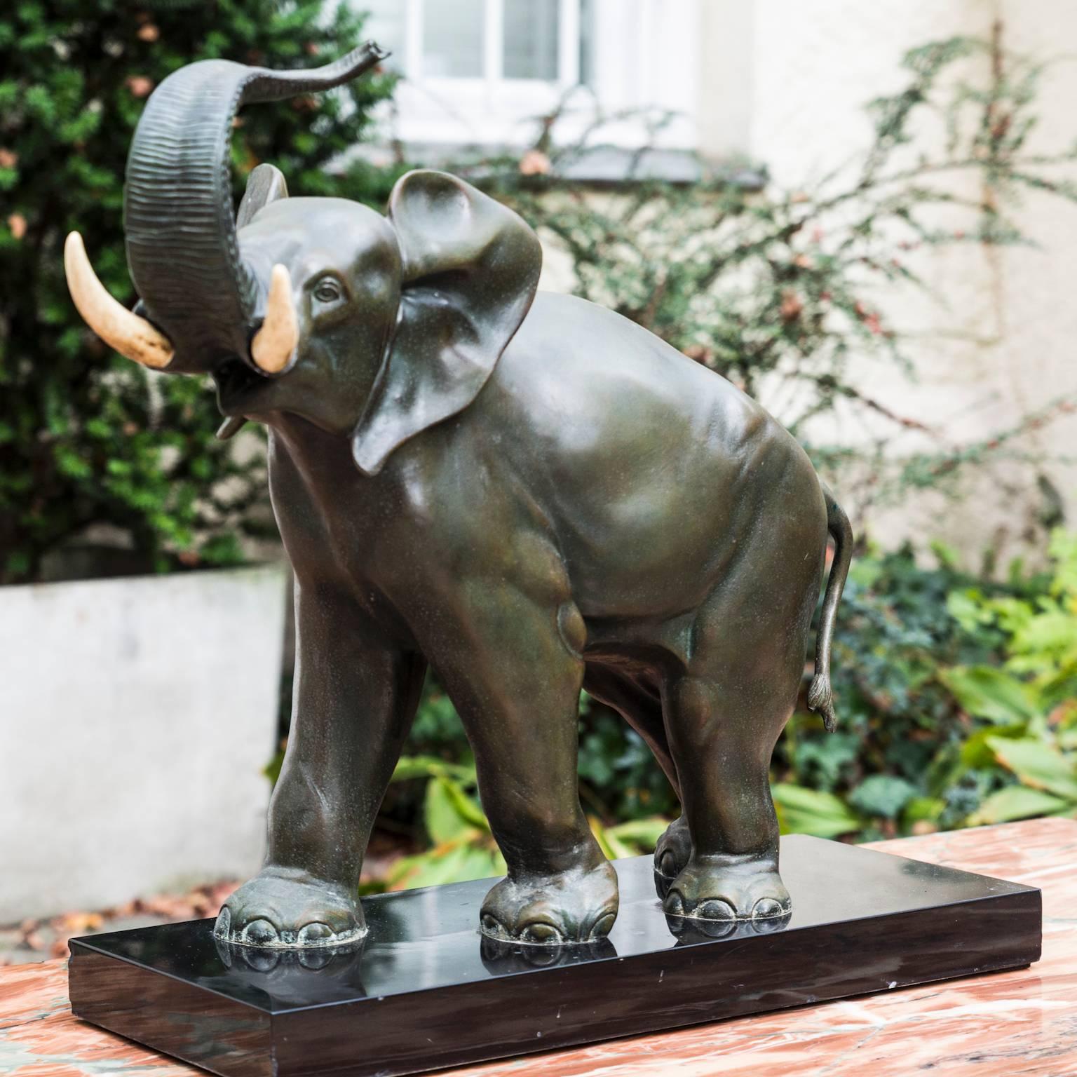 Impressive bronze Art Deco sculpture of elephant on black marble base. The tusks are made of horn.
Artist/ Maker: Irénée Rochard.
Signature/Marks: Rochard on the base.
Bronze.