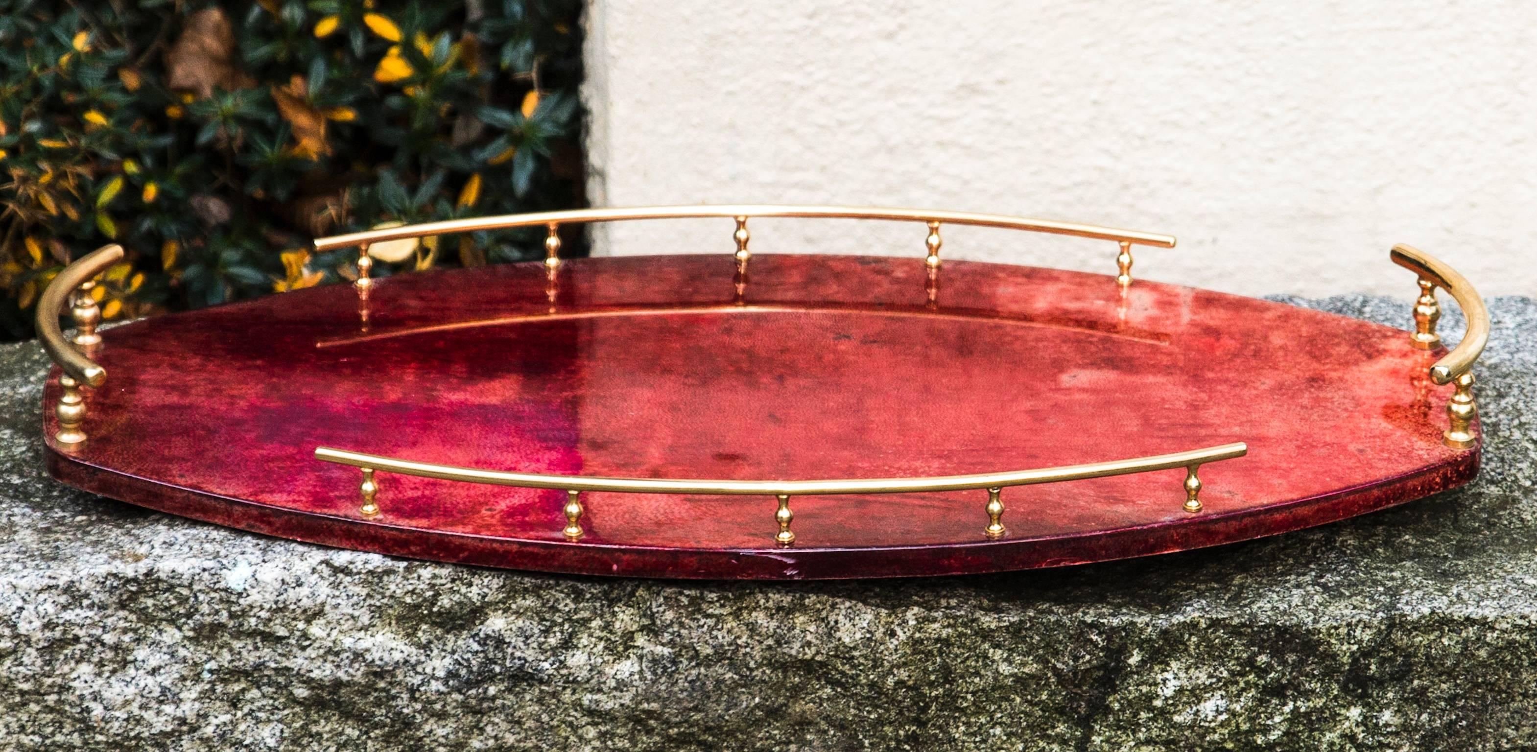 Fine serving tray in red parchment, made by Aldo Tura Italy in 1960.