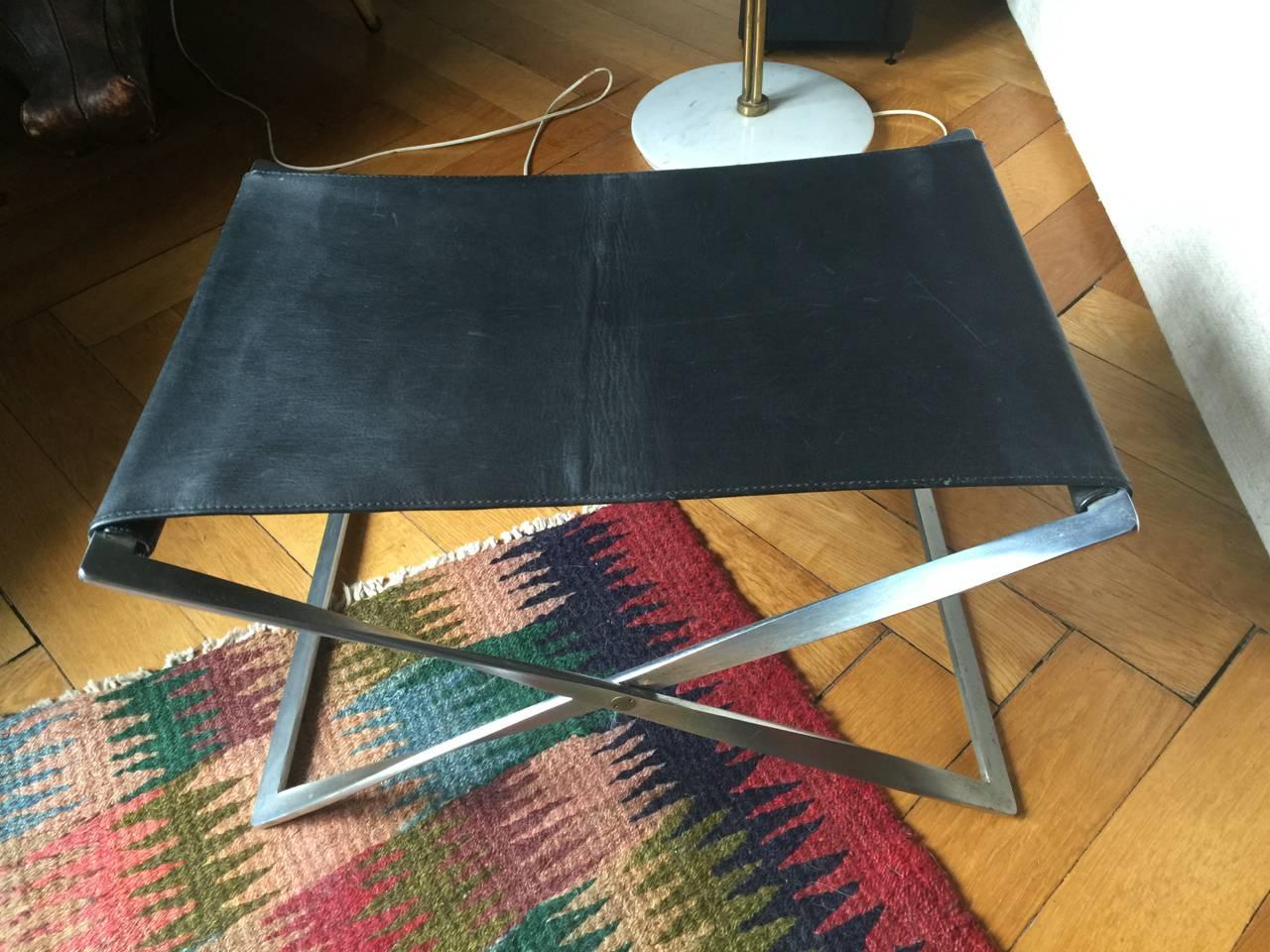 Rare and early folding stool in 100% original and perfect condition. Matt chromed forged steel with welded corners. Recognize the zig-zag steps of the early production! Original and early ivan schlechter leather !!

LOCATED IN HAMBURG