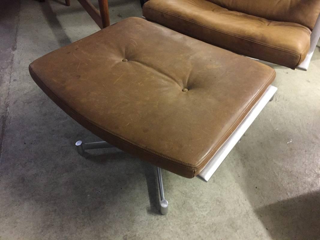 Very rare and on special order original upholstered in patinated natural leather.