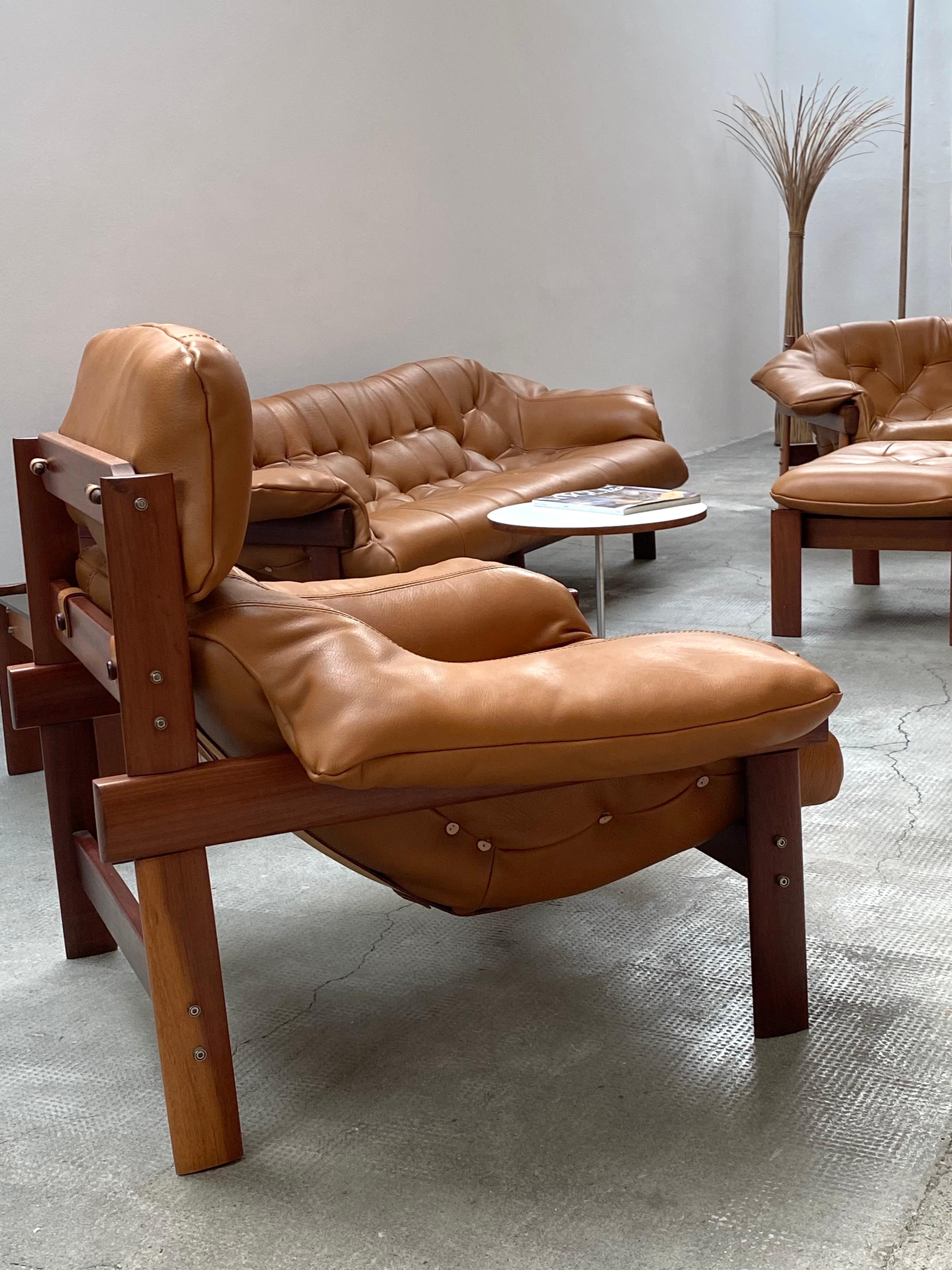 A unique and beautiful Percival Lafer MP-41 set consisting of a 3-seater sofa, 1 high-back armchair, 1 low-back armchair, ottomans, and a small coffee table in an exclusive custom design.

5 pieces in total.

The entire set is in very good original