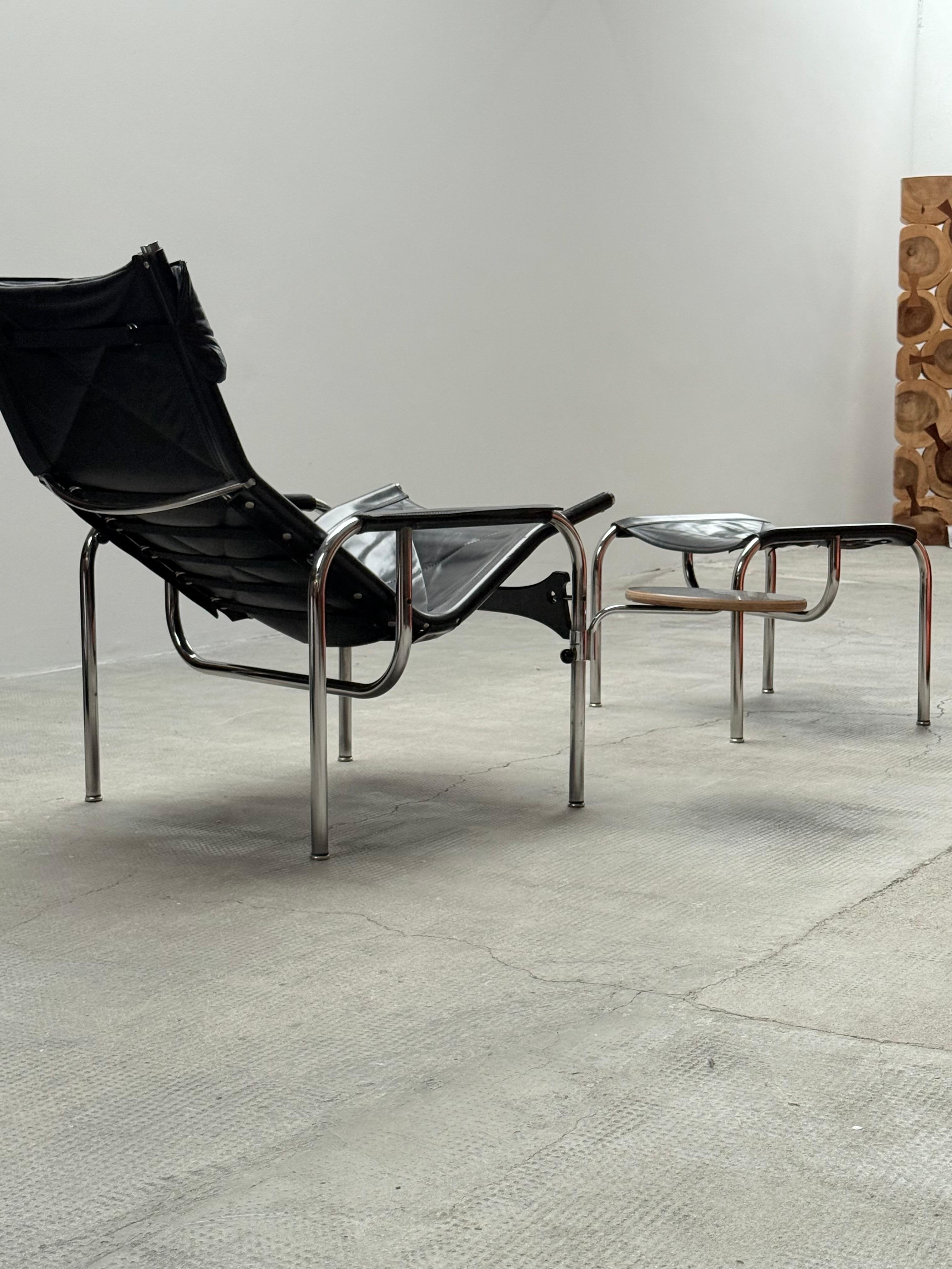 Suisse HANS EICHENBERGER FOR STRÄSSLE LOUNGE ARMCHAIR WITH STOOL LEATHER STEELTUBE, années 60 en vente