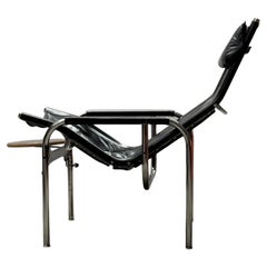 SILLÓN DE SALÓN HANS EICHENBERGER PARA STRÄSSLE CON TABURETE DE CUERO TUBO DE ACERO, años 60