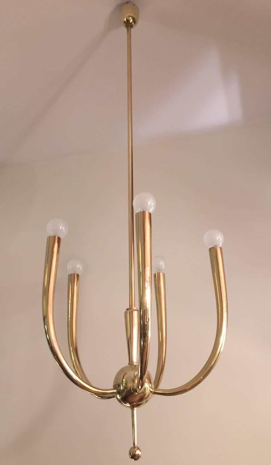 A brass ceiling chandelier designed by Oscar Torlasco for Lumi. Edited in 1940s.
The chandelier has been rewired and polished. Excellent condition.
Shipping to USA: 320 Euros.
Shipping to Europe :220 Euros.