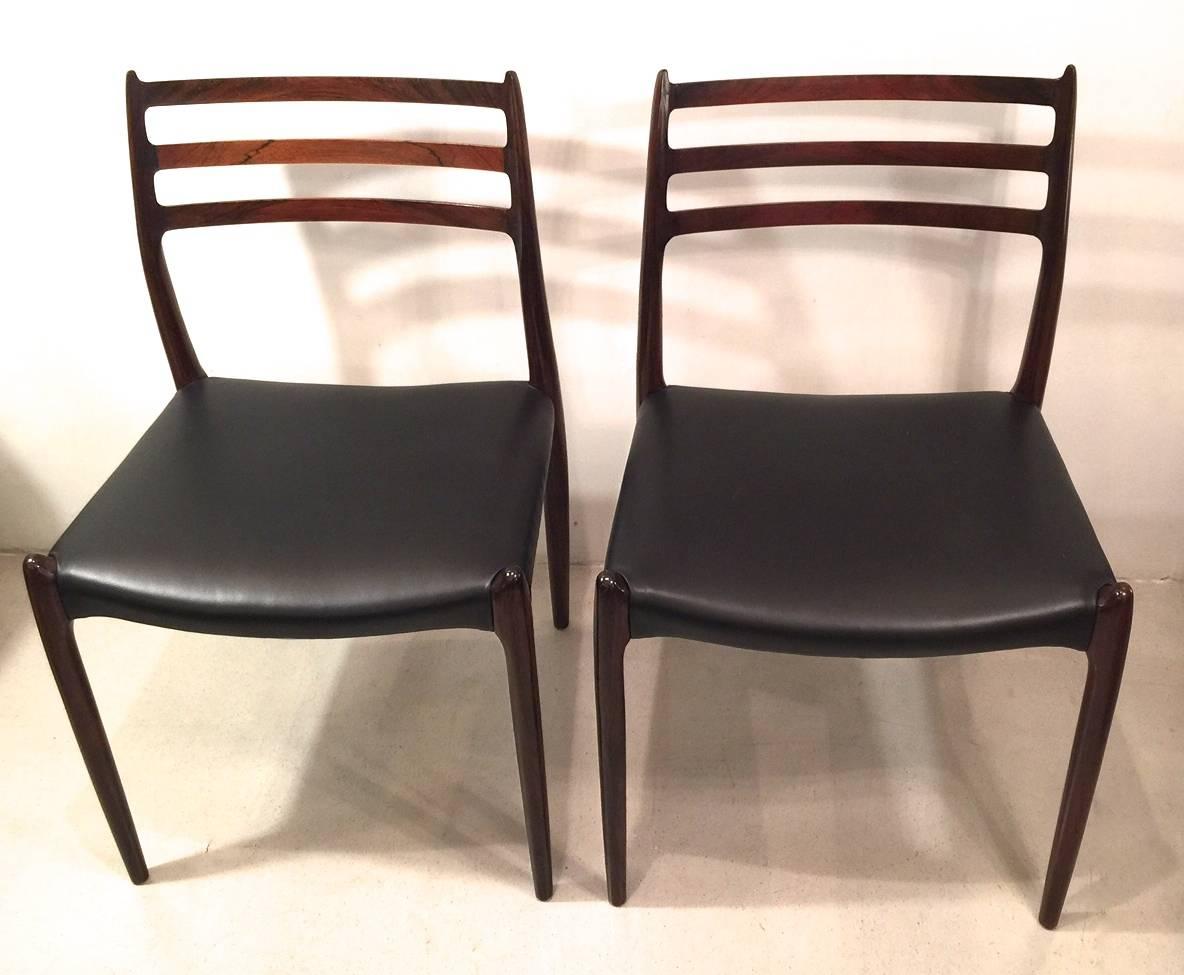 Scandinavian Modern Set of Four Rio Rosewood Patinated Leather N.O.Moller Chairs