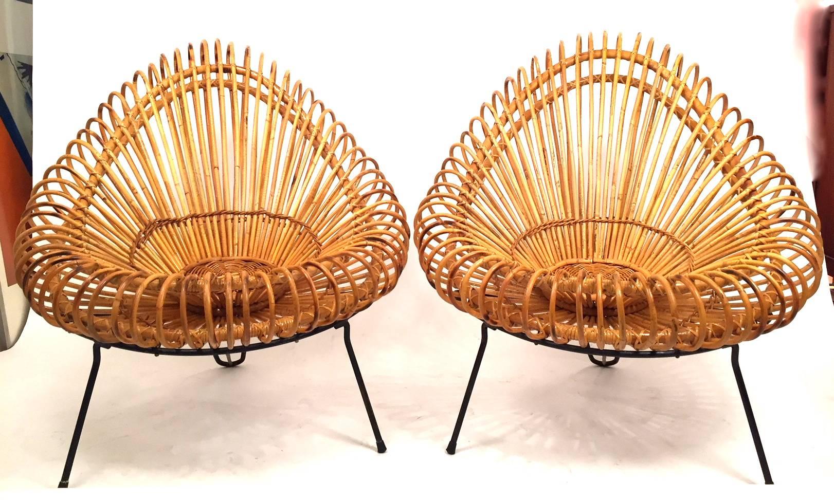 A pair of wicker lounge chairs designed by Janine Abraham and architect Dirk Jan Rol and edited by Rougier in 1955.
Bamboo seat and black lacquered frame. All original. Super condition.
