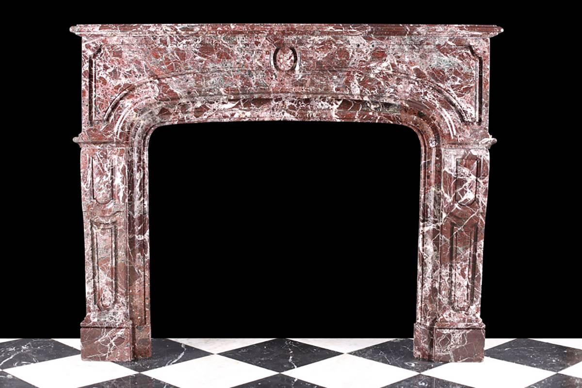 Antique Louis XIV Regency chimneypiece in red levanto marble.

Measures: Depth 17 1/2