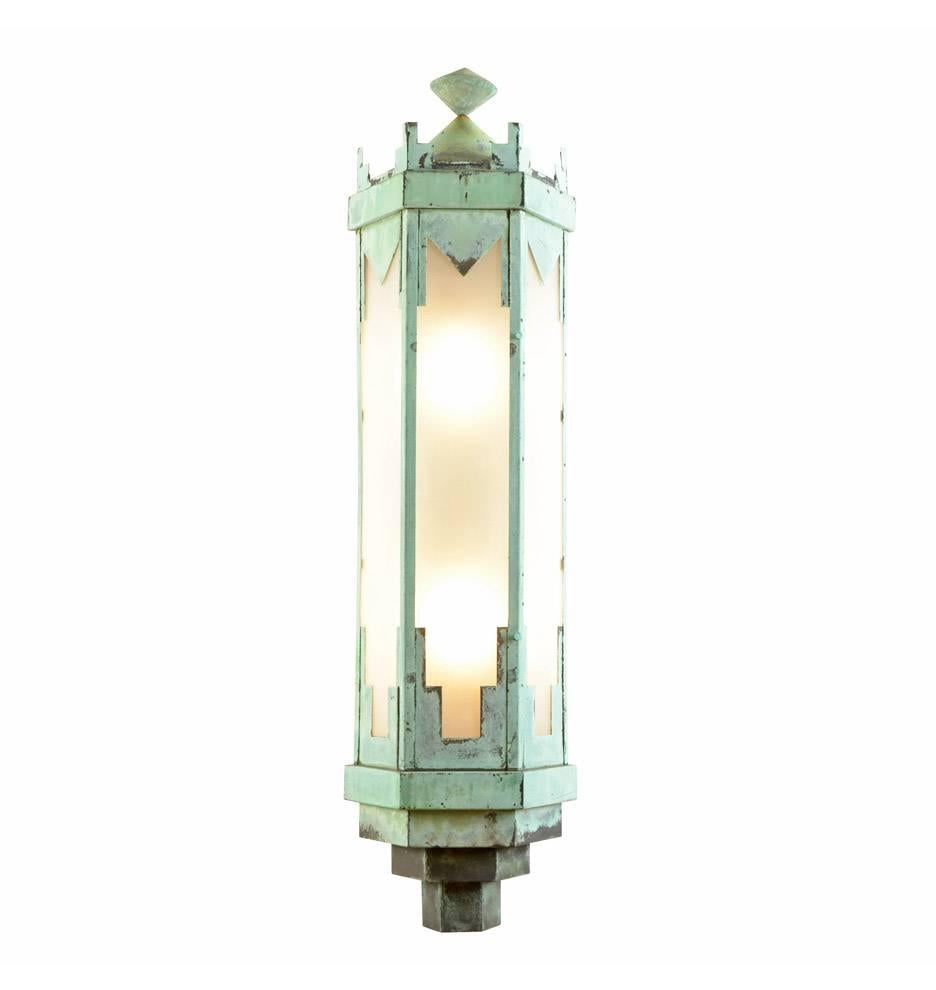 Perfectly oxidized copper, incredible Art Deco ziggurat motifs, monumental proportions, these are just a few of our favorite things about these remarkable and historic outdoor sconces. Salvaged from a bank or large municipal building (we imagine),